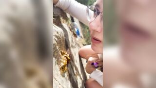 Amateur girl pooping in front of her friend outdoors then licks her shit