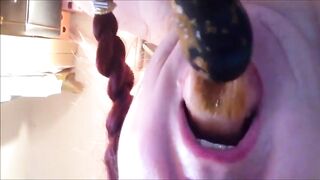 Girl is licking a shitty dildo
