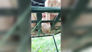 White boy pooping and peeing through chair in forest